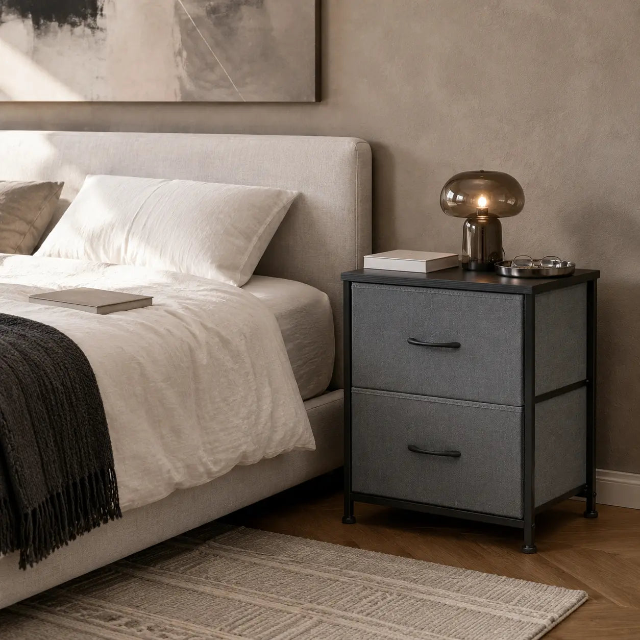 Grey fabric nightstand beside a bed in a warm modern bedroom