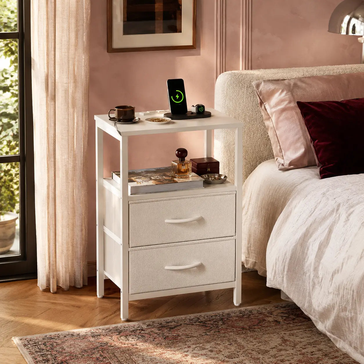 Black nightstand beside a bed, shown at room scale