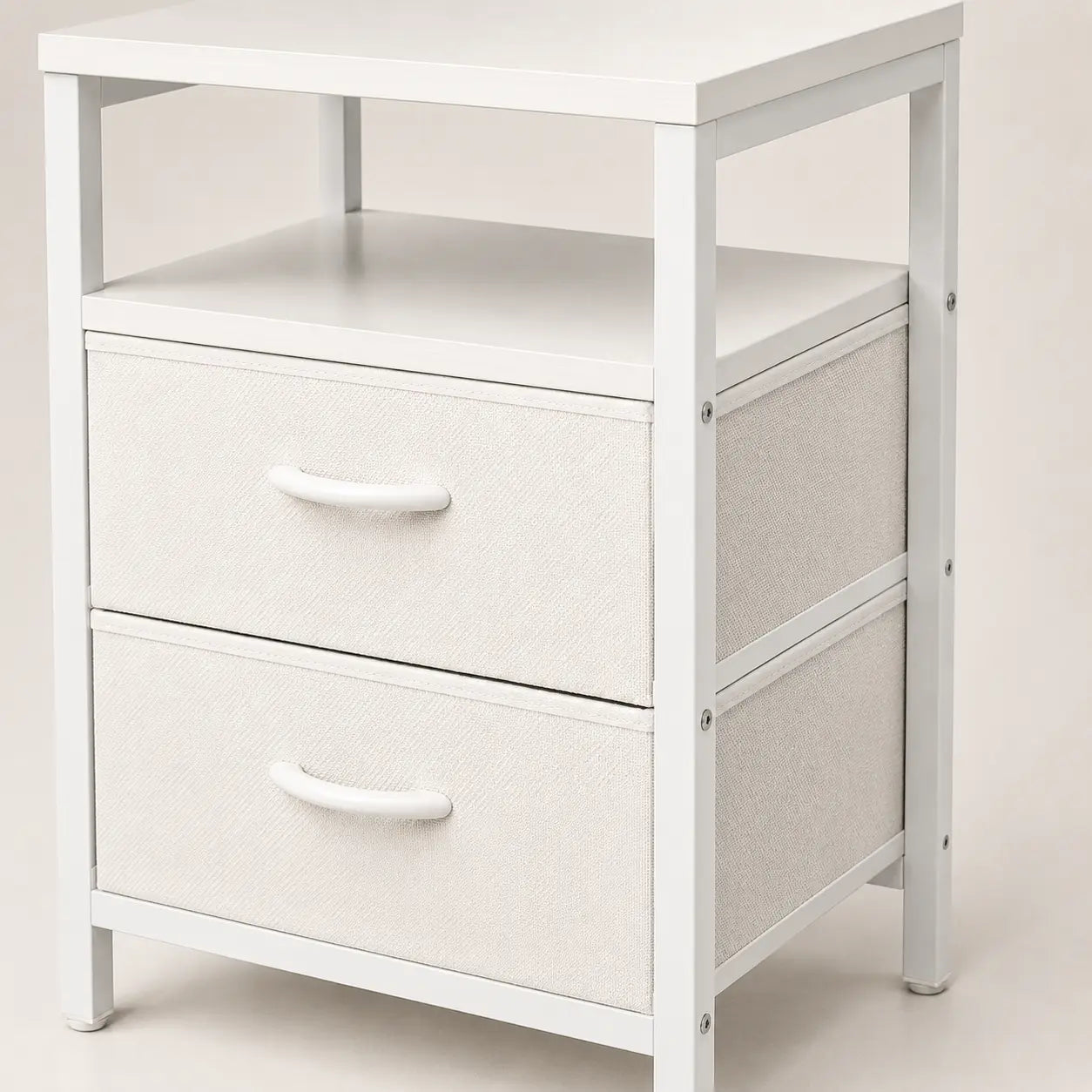 Close-up of the white nightstand's open shelf and drawer construction
