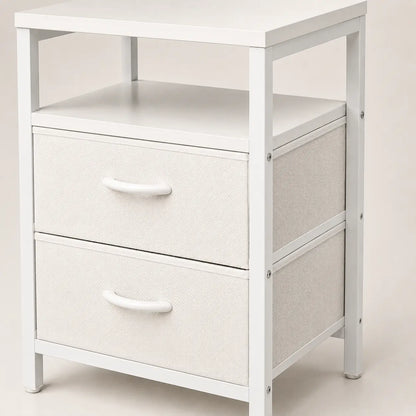 Close-up of the white nightstand's open shelf and drawer construction