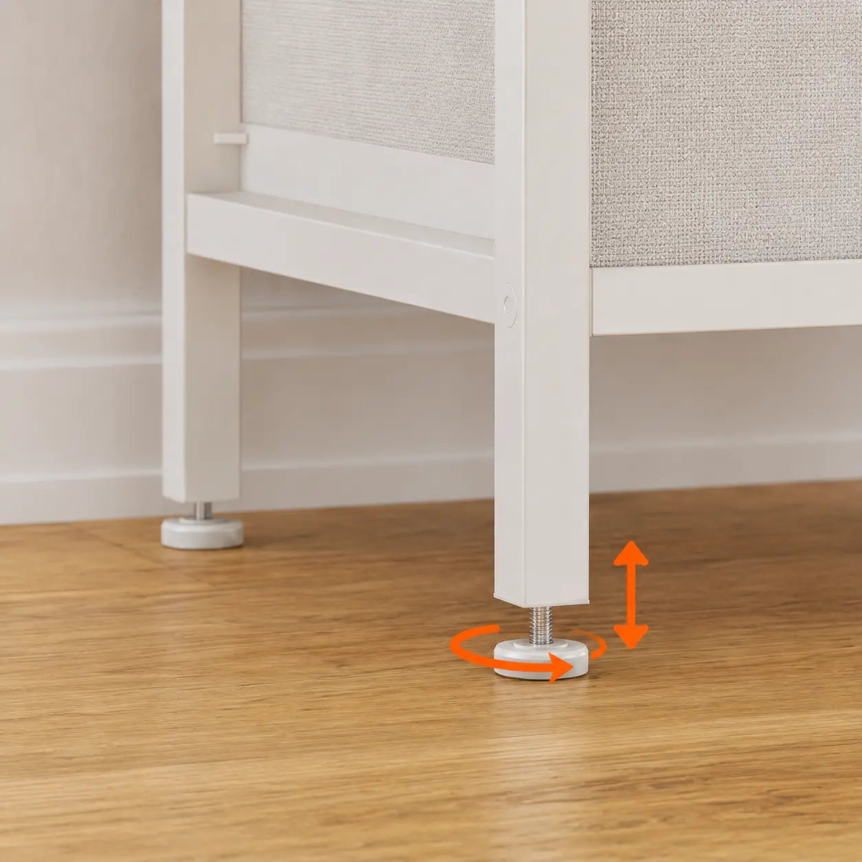 Metal frame and foot detail where the nightstand meets the floor