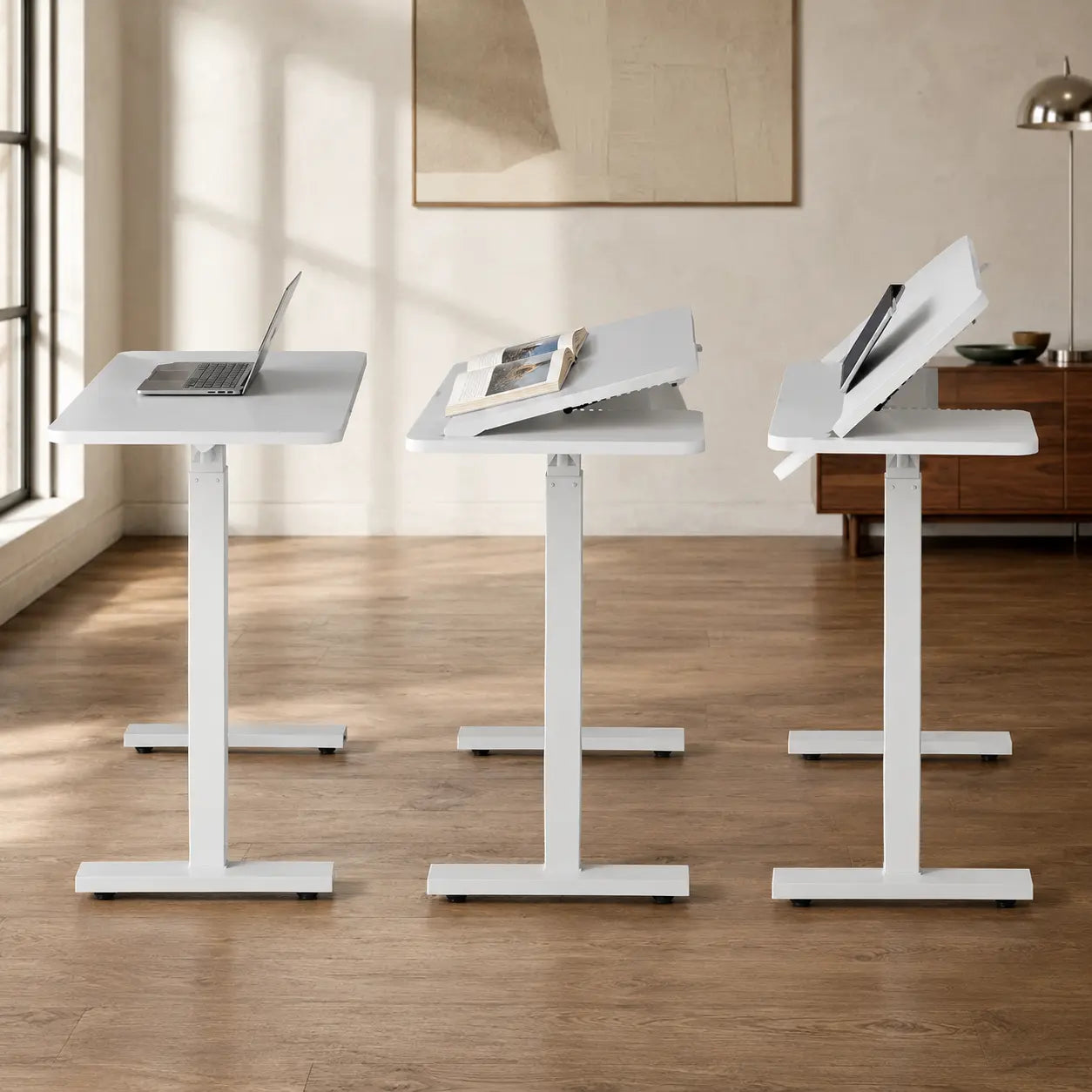 Mobile workstation shown at multiple adjustable heights